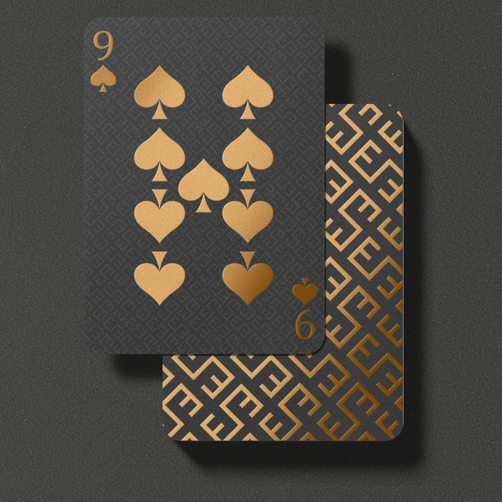 playing cards with gold plated design